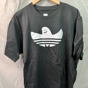 Black adidas tee.